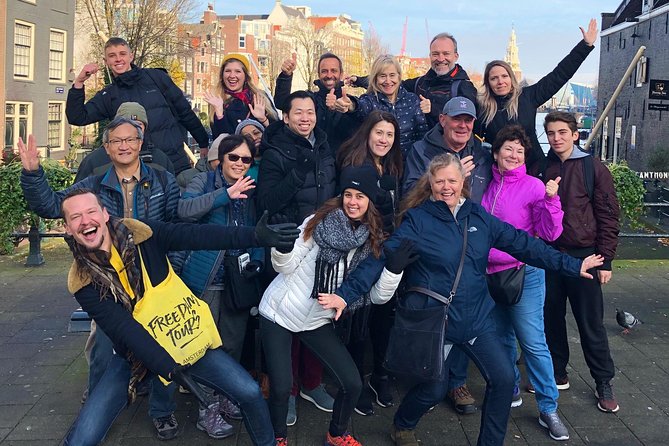 Absolutely Amsterdam - the Essential Introductory Walking Tour - Damrak and the Red-Light Origins: Church, Profit, and Legal Reality
