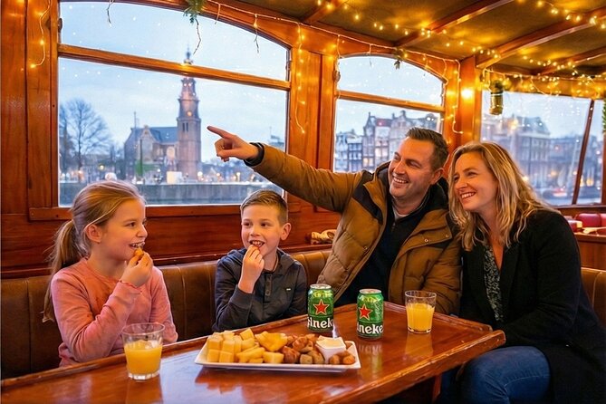 Amsterdam 1-Hour Canal Cruise With Live Guide - Boat comfort: open-air views, blankets, and winter heat