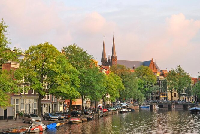 Amsterdam 1h Canal Cruise by Semi-Open Boat with Audio Guide - Key Things to Know Before You Go