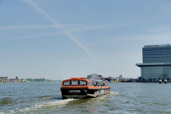 Amsterdam 1h Canal Cruise by Semi-Open Boat with Audio Guide - Magere Brug (Skinny Bridge) and the Medieval City References
