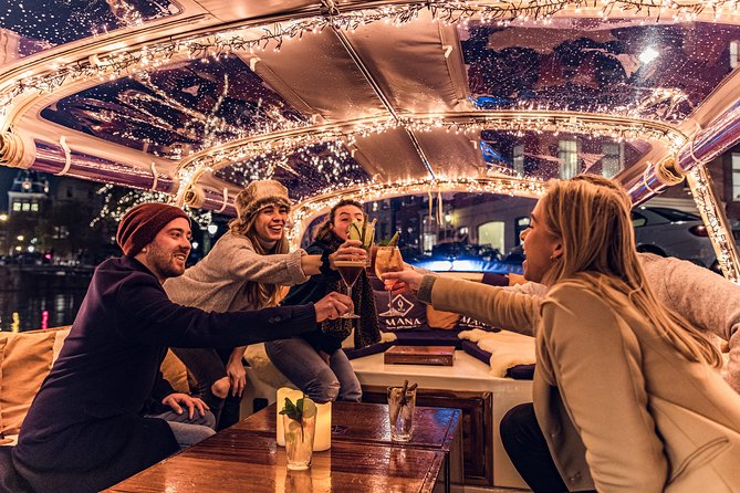 Amsterdam 2-Hour Evening Cruise With Live Guide and Bar - The route: from the 17th-century canal ring to Skinny Bridge lights