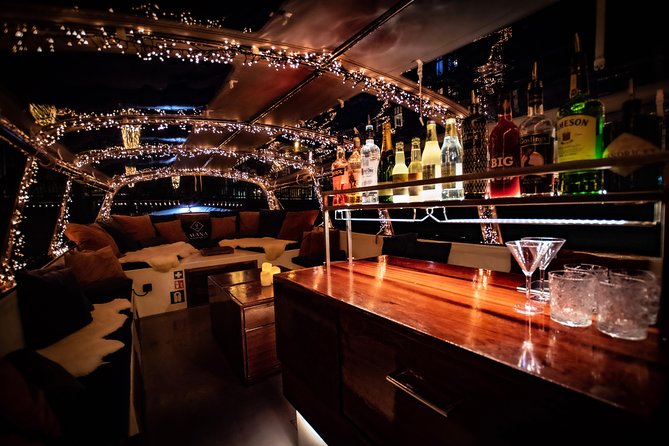 Amsterdam 2-Hour Evening Cruise With Live Guide and Bar - Churches, the Amstel River, and the beer-story connection