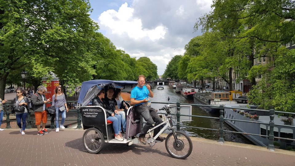 Amsterdam: 2-Hour Sightseeing Tour by Rickshaw - Timing and photo stops: covering a lot without feeling like a sprint