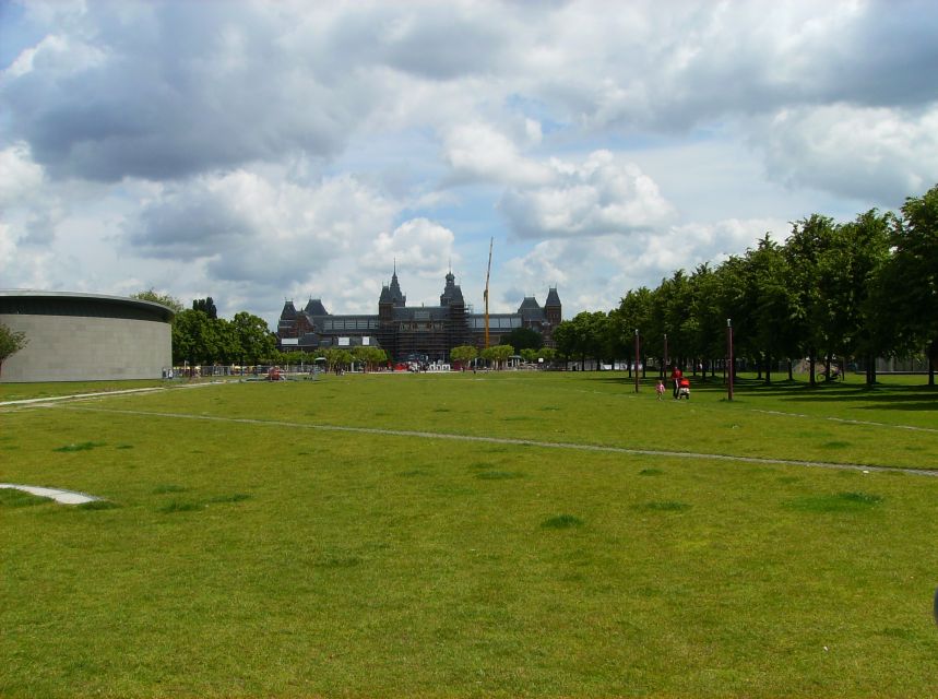 Amsterdam: 2-Hour Sightseeing Tour by Rickshaw - Rain plan and small practical limits you should know