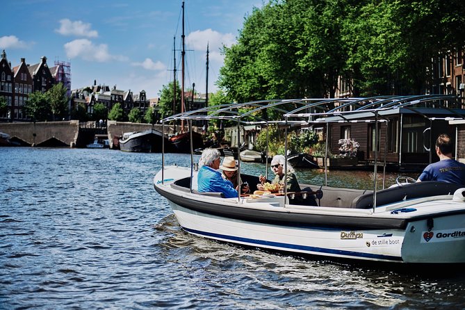 Amsterdam: 60-Minute Guided Private Canal Cruise with Drinks - Westerkerk Skyline Moment and Rembrandt’s Connection
