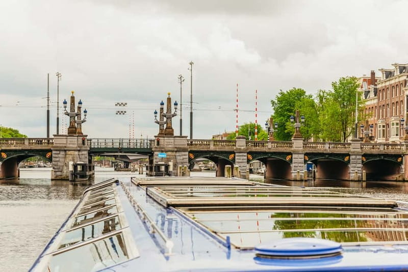 Amsterdam: 75 Minute City Canal Cruise with Audio Guide - Westerkerk and the Landmark Blend Along the Route