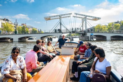 Amsterdam: 75 minute Open Boat Canal Cruise with Live Guide - Meeting at Stadhouderskade 501: where you start and how to find the dock