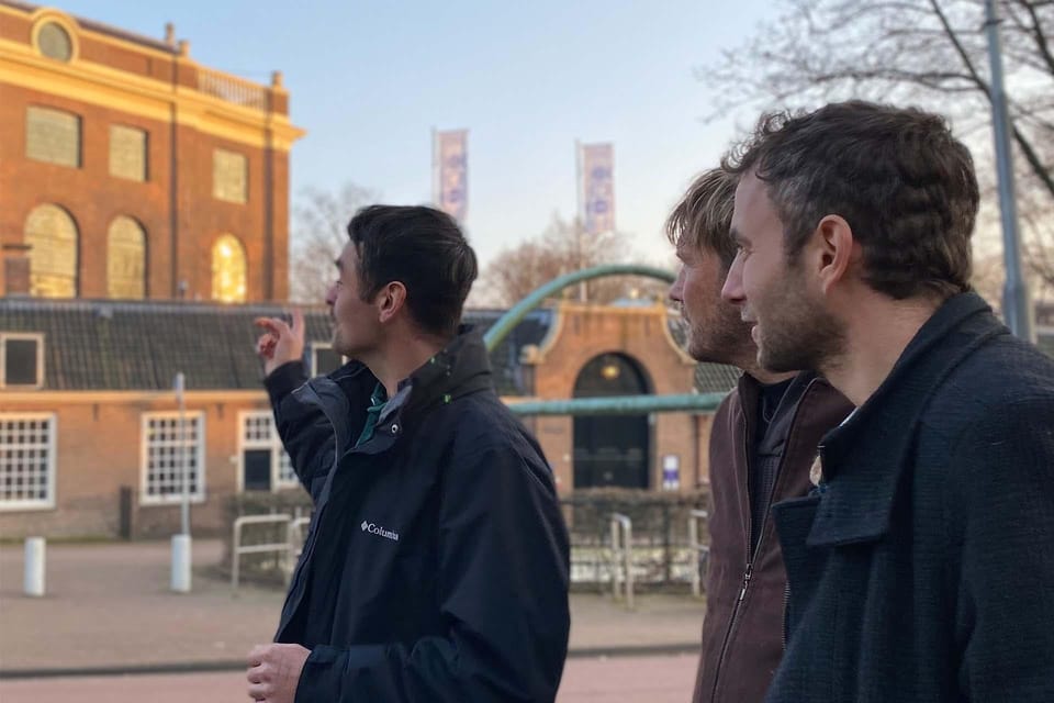 Amsterdam: Anne Frank Guided Small Group Walking Tour - Practical Tips for Rainy Canal Weather and Heavy Streets