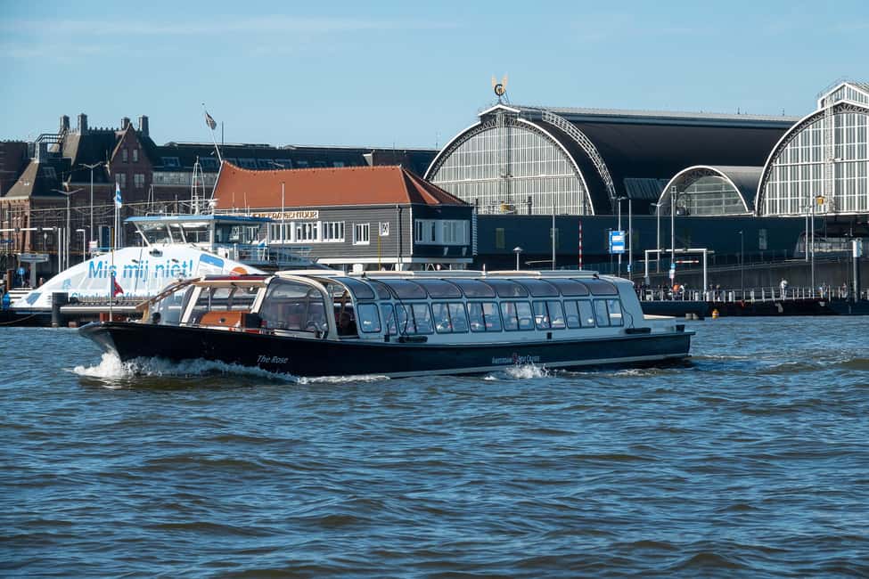 Amsterdam: Canal Cruise with Live Commentary & Audio Guide - Live captain commentary plus multilingual audio that actually helps