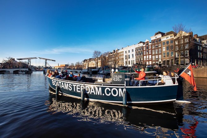 Amsterdam Canal Cruise With Live Guide and Unlimited Drinks - Entering Amsterdam by Water Without the Land Crowds