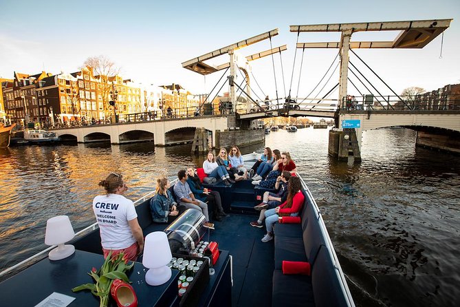 Amsterdam Canal Cruise With Live Guide and Unlimited Drinks - Open-Air in Summer, Covered in Winter, Heated When It Counts