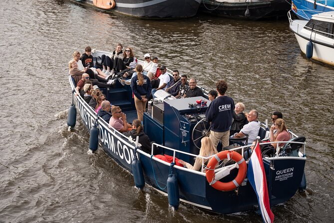 Amsterdam Canal Cruise with Live guide & Two drinks - Central St. - Passing the Red-Light District: What to Expect and How It’s Framed