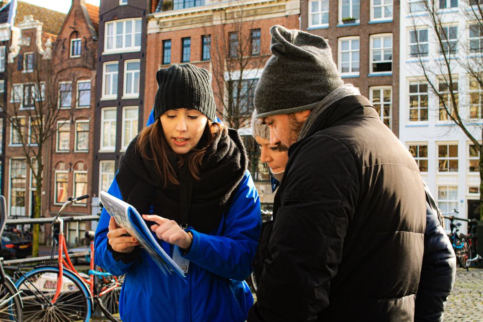 Amsterdam: City Center Walking Tour in italian - Key moments worth showing up for