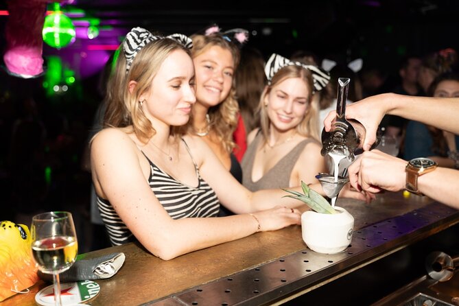 Amsterdam: City Centre Bar Crawl and Nightlife Experience - Leidseplein and Rembrandtplein at night: what this 5.5-hour crawl really delivers