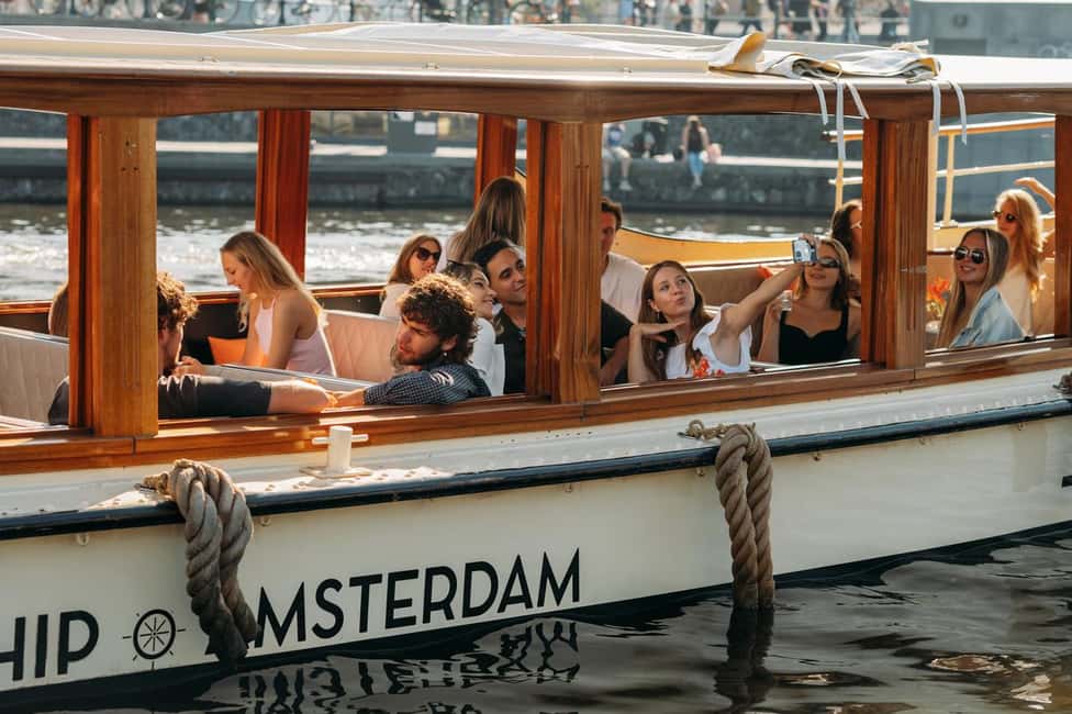 Amsterdam: Classic Boat Cruise with Optional Cheese & Wine - Covered Boat Comfort: Why It Helps on a Real Amsterdam Day