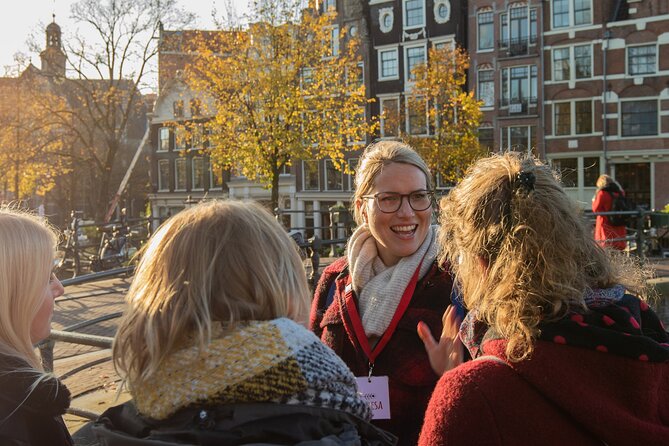 Amsterdam: Cultural Highlights in English/German/Italian - Dam Square and the origin story: old city roots and royal power