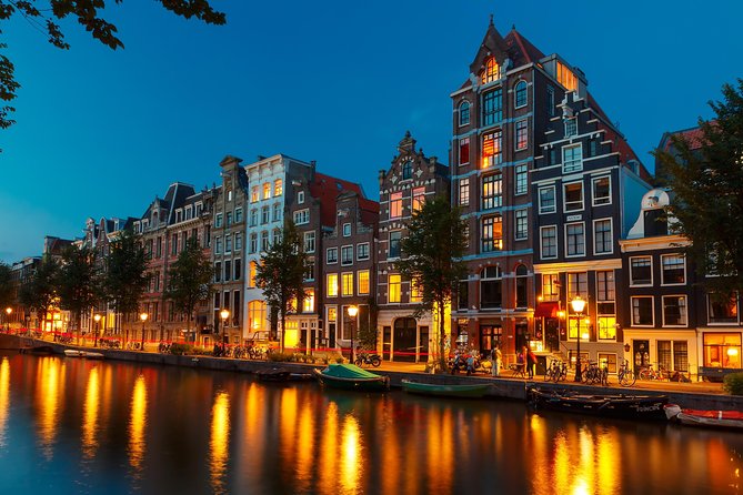 Amsterdam Evening Canal Cruise with Live Guide and Onboard Bar - Westerkerk and Carré: church bells, culture, and what’s close together