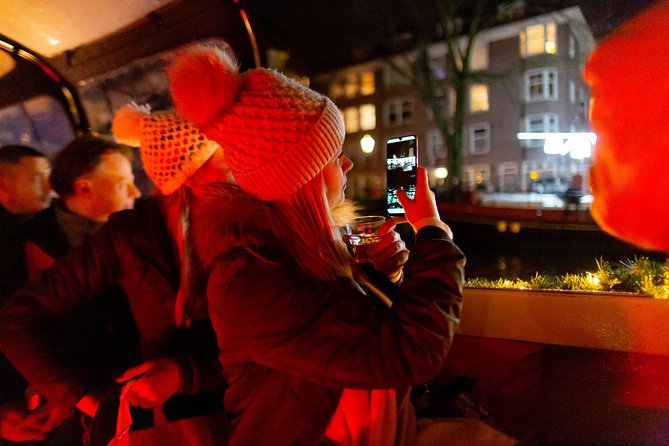 Amsterdam Evening Canal Cruise with Live Guide and Onboard Bar - Anne Frank House: seeing the refuge from the canal ring