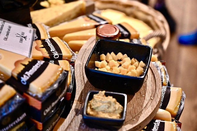 Amsterdam Food Tour of 10+ Local Classic Tastings in Jordaan Area - Landmark Passes That Make Food Feel Like Part of the City