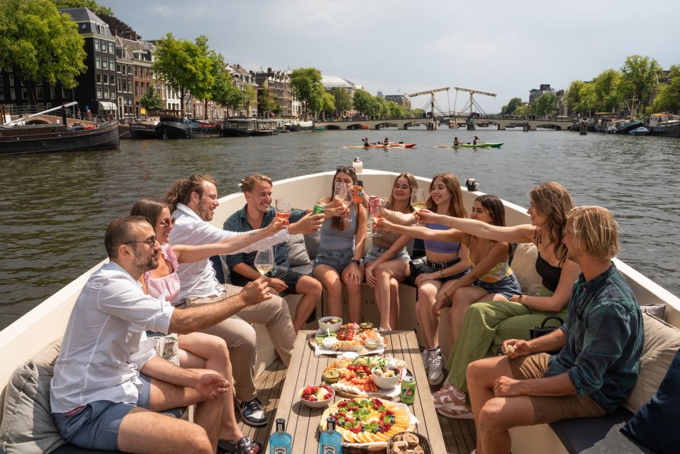 Amsterdam: German Guided Canal Cruise with on Board Bar - First stretch: Dancing Houses, Zuiderkerk, and Munttoren