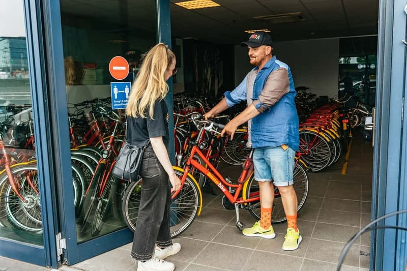 Amsterdam: Guided Bike Tour City Centre in EN/DE/FR/ES - Het Scheepvaartmuseum area and the Maritime Quarter finish