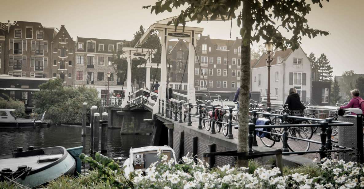 Amsterdam: Guided City Bike Tour in French - Starting at IJdok 47: the easiest way to get your bearings