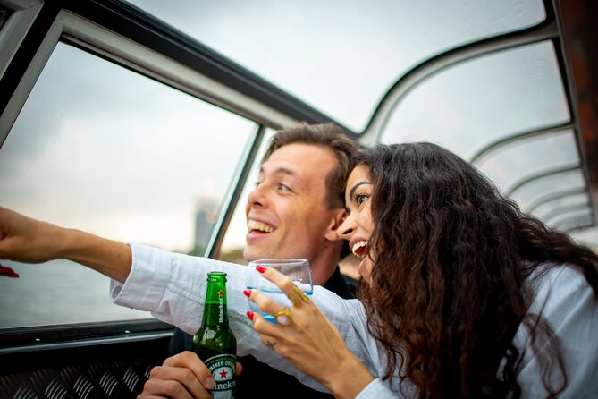 Amsterdam Guided Cruise with New York Pizza, Drinks and Ice Cream - The canal route at night: what each stop means as you pass by