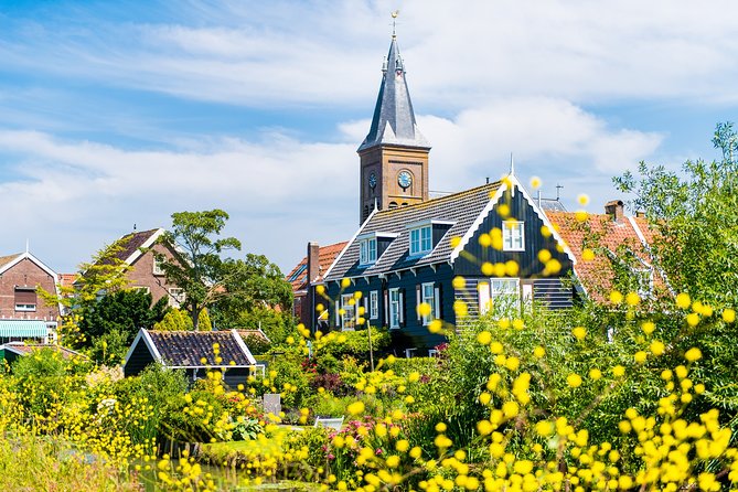 Amsterdam: Keukenhof, Zaanse Schans & Volendam Tour - Back in Amsterdam: Free Lunch Time and the Keukenhof Switch