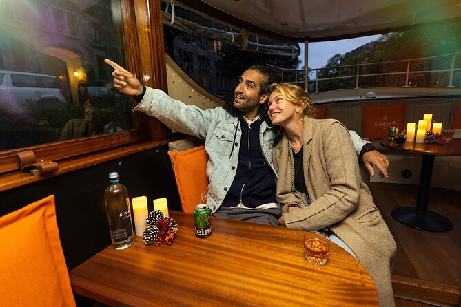 Amsterdam Light Festival: Heated Cruise with Hot Drinks & Bite - Heated comfort has trade-offs: windows, crowds, and sightlines