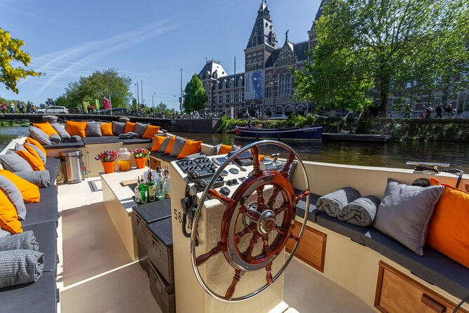 Amsterdam Light Festival: Saloon Boat Cruise + Hot Drinks & Bite - Amsterdam Light Festival by saloon boat: the setting you came for