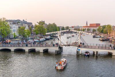 Amsterdam Luxury Canal Cruise + Unlimited Drinks & Bites option - Entering the Canal Ring: Jordaan and Prinsengracht First