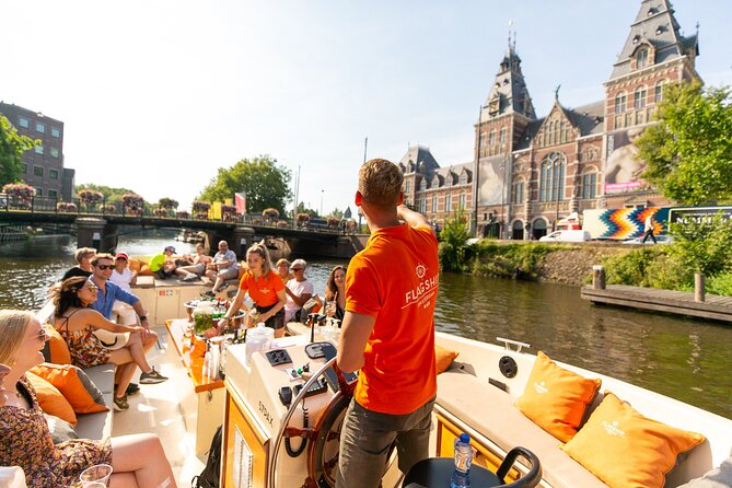 Amsterdam Luxury Canal Cruise + Unlimited Drinks & Bites option - Leidseplein, Bloemenmarkt, and the Bridge Photo Challenge