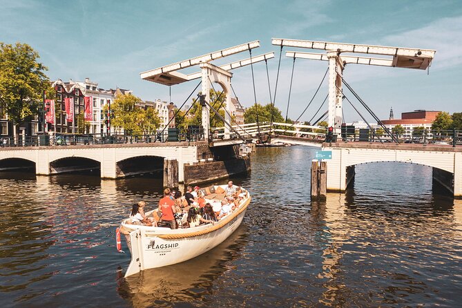 Amsterdam Luxury Canal Cruise + Unlimited Drinks & Bites option - Winter vs Summer Boats: Open Sloep or Warm Saloon