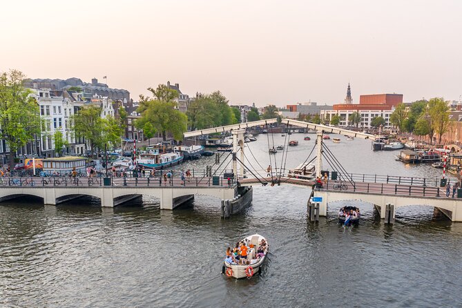 Amsterdam Luxury Canal Cruise + Unlimited Drinks & Bites option - Entering the Canal Ring: Jordaan and Prinsengracht First
