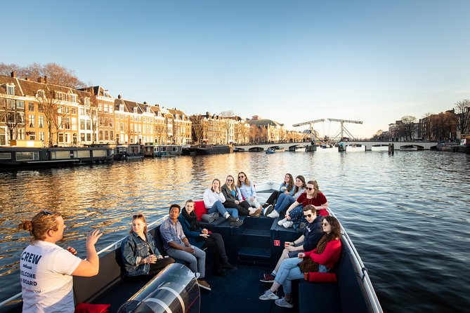 Amsterdam Open Boat Cruise with Live Guide and Two Drinks - Electric open-air boat with live guide talk (not just sightseeing)