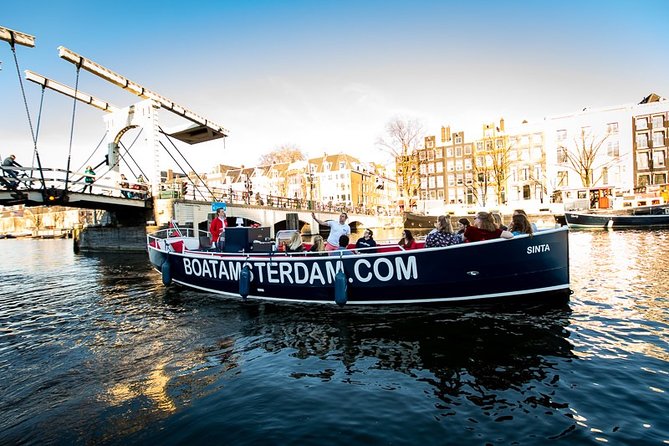 Amsterdam Open Boat Cruise with Live Guide and Two Drinks - What you’ll pass on the canal route (and how to watch it)