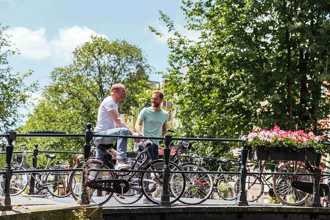 Amsterdam PRIVATE Bike Tour With Locals: Bike & Local Snack Included - The value: a private bike intro to Amsterdam, not a generic loop