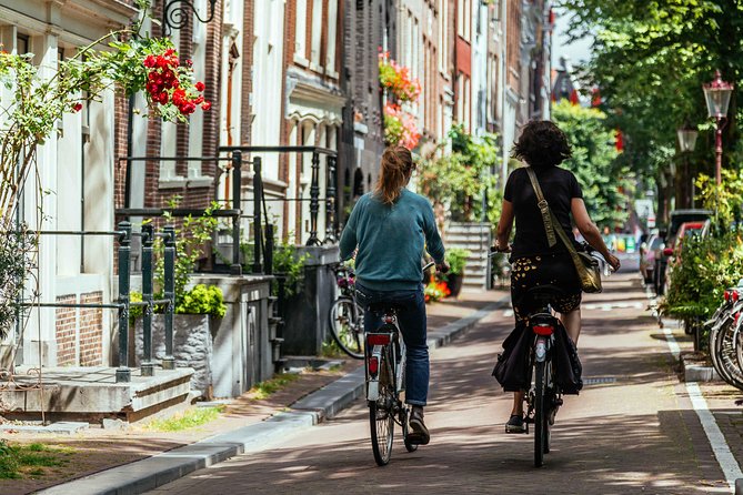 Amsterdam PRIVATE Bike Tour With Locals: Bike & Local Snack Included - Itinerary flexibility: your host can tweak the plan to fit you