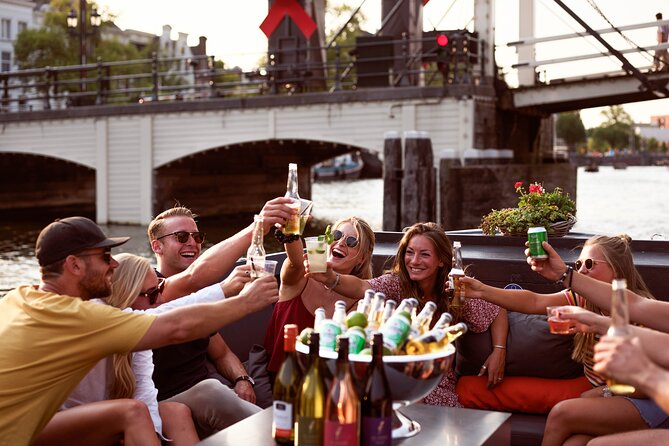 Amsterdam Private Boat Tour with Unlimited Drinks - Your skipper and the onboard vibe: comfort, stories, and pacing