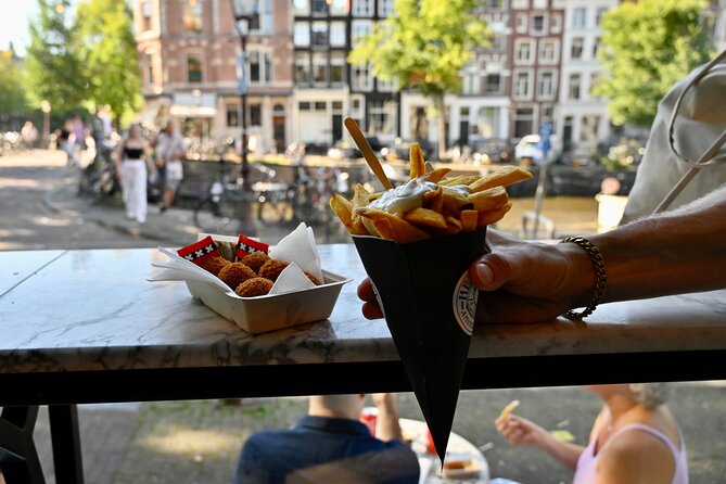 Amsterdam Private Food & Drinks Tour by UNESCO Canals & Jordaan - Canals, Bloemenmarkt, Spui, and the 9 Little Streets in one walk