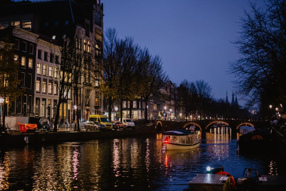 Amsterdam: Private Romantic Evening Boat Tour with Prosecco - The boat setup: retractable roof, blankets, and a calmer pace