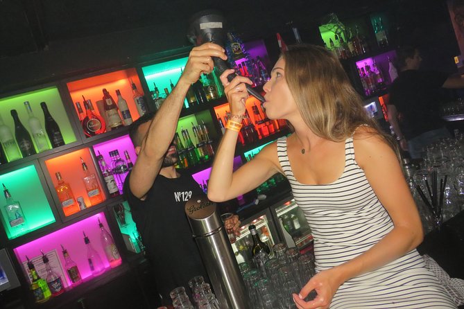 Amsterdam Red Light District Pub Crawl - Red Light Bar and Café De Buurvrouw: quick stops, party games, and momentum
