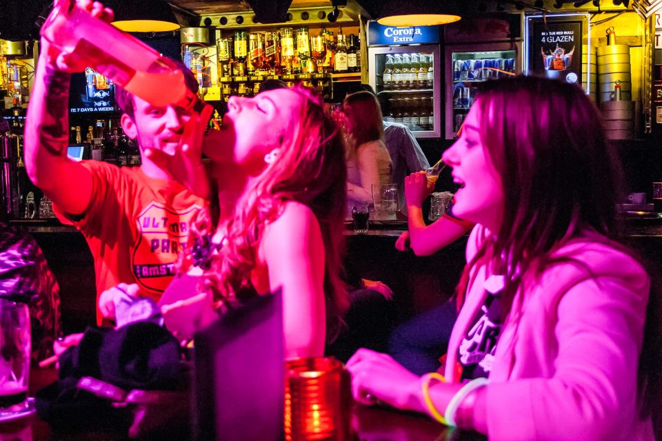 Amsterdam: Red Light District Pub Crawl with Unlimited Shots - Key highlights you’ll feel in the first hour
