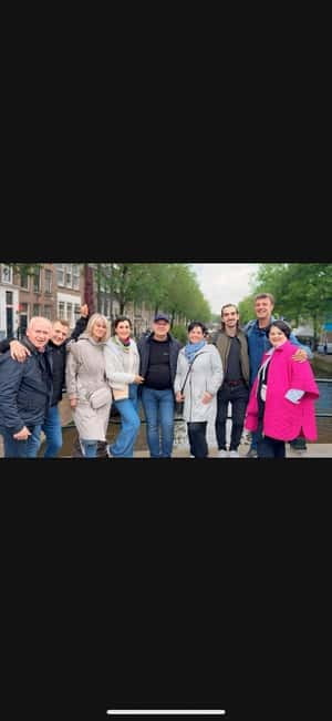 Amsterdam: Red light tour in German/English for groups of 4 people or more - St. Nicolas Church meet-up and the 2-hour walking rhythm