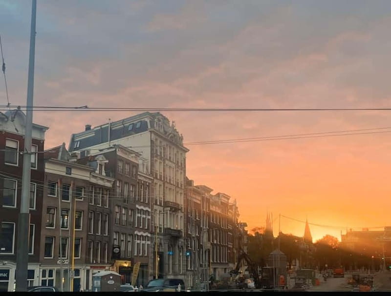 Amsterdam: Red light tour in German/English for groups of 4 people or more - Stops for entertainment ideas: shows, bars, and pubs along the way