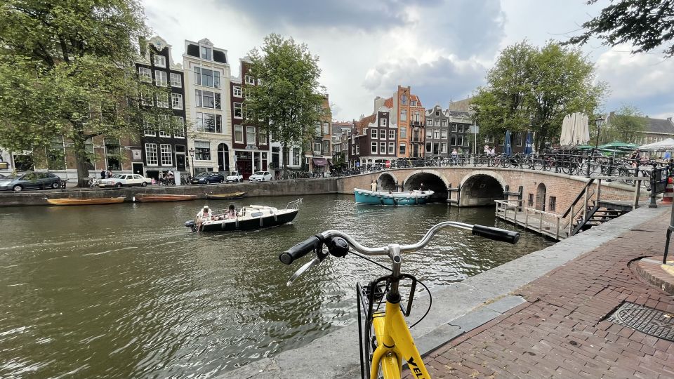 Amsterdam: Relaxed City Highlights Guided Bike Tour - Vondelpark’s green reset: cycling into a local favorite