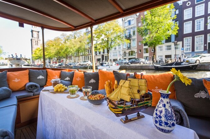 Amsterdam Small-Group Bike Tour With Canal Cruise, Drinks, Cheese - ARTIS Zoo outskirts: small peek, big city energy
