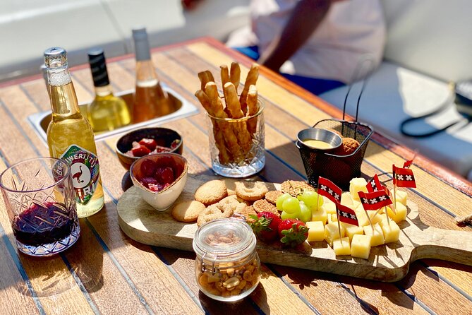 Amsterdam Small-Group Canal Cruise Including Snacks and Drinks - Small-group energy with captains like Erik and Stephen