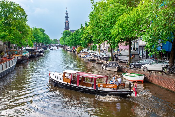 Amsterdam Small-Group Canal Cruise With Dutch Snacks and Drink - The UNESCO canal belt, Jordaan, and the Amstel: the real Amsterdam route