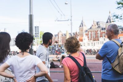 Amsterdam Small-Group Walking Tour - Beursplein and Dam Square: from trading hub to civic center